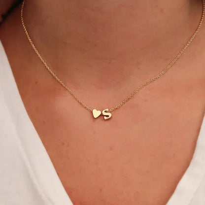HeartSylé Necklace – Minimal Heart Charm with a Personalized Initial in a Refined Gold or Silver Finish