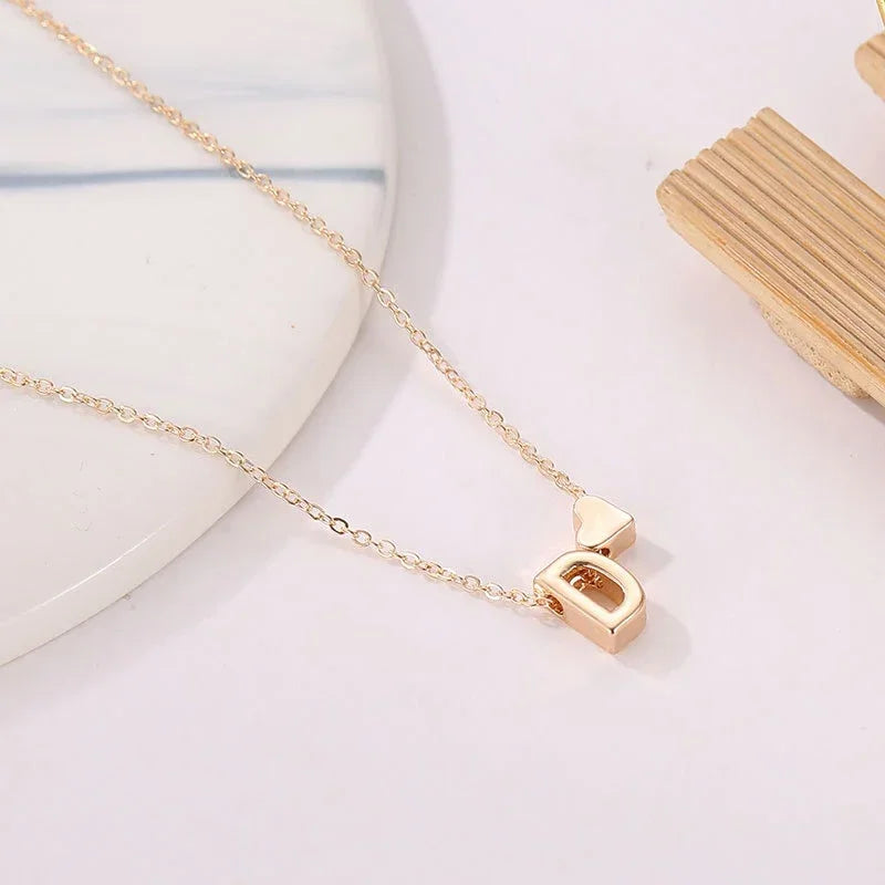 HeartSylé Necklace – Minimal Heart Charm with a Personalized Initial in a Refined Gold or Silver Finish